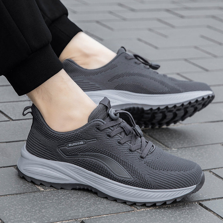 Anouk donkergrijze hardloopschoenen, zijaanzicht gedragen