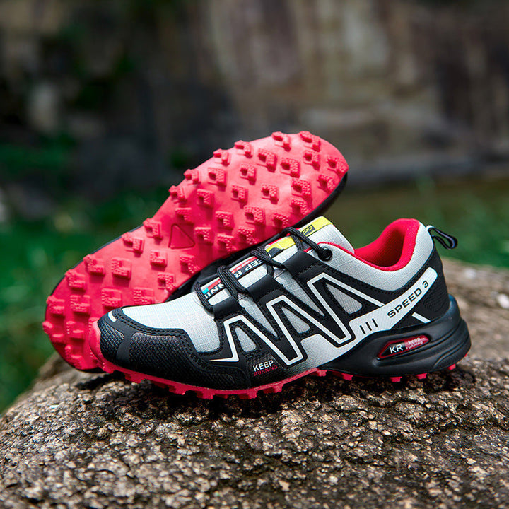 Anouk grijze trail hardloopschoenen met rode zool