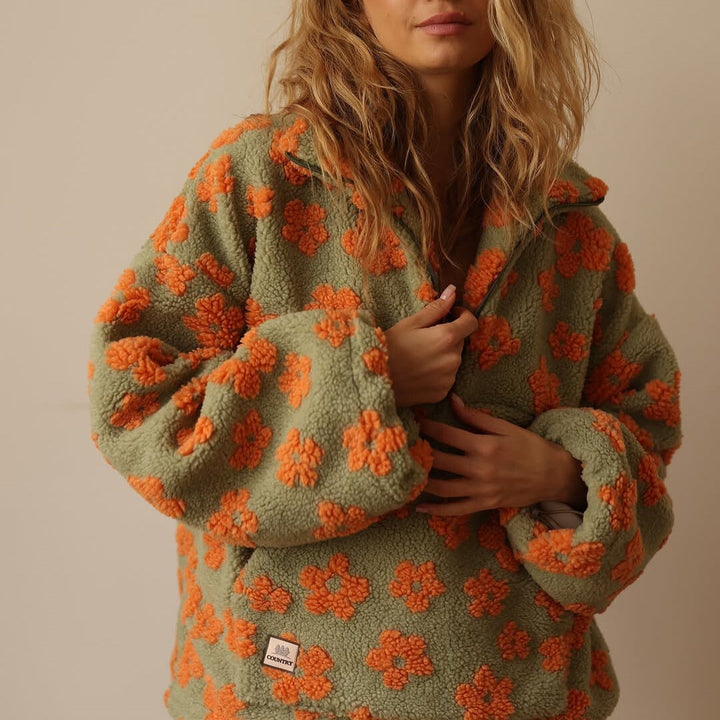 Bente bloemenprint fleece trui, close-up voorzak en rits