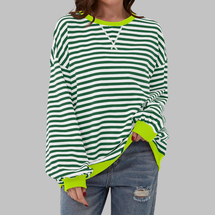 Femke groen wit gestreepte sweater met neongele boorden, vooraanzicht