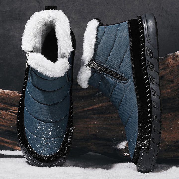 Femke gevoerde snowboots in blauw, boven- en zijaanzicht met bontkraag