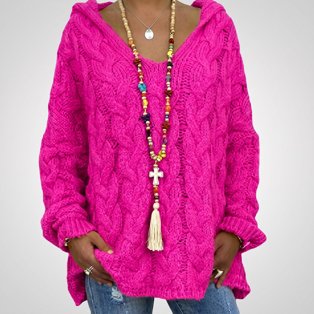 Kaylee felroze oversized kabelgebreide trui met V-hals, studiofoto