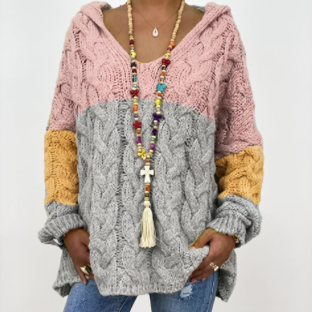 Kaylee kleurenblok kabelgebreide trui met V-hals, close-up