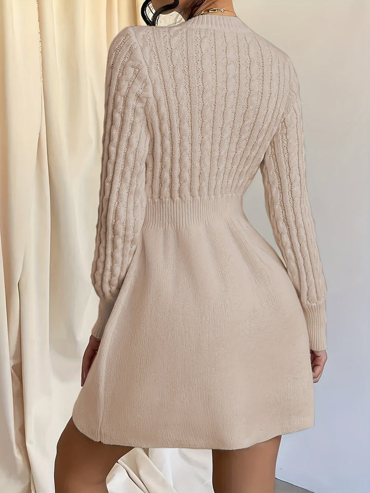 Marit kabelbrei winterjurk in beige, achteraanzicht
