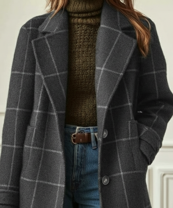Close-up van de reverskraag van de Marit coat in grijs