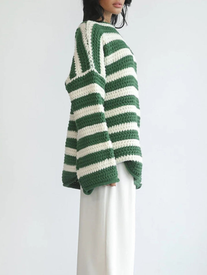 Noor grofgebreide oversized trui met streepdessin, close-up zijkant