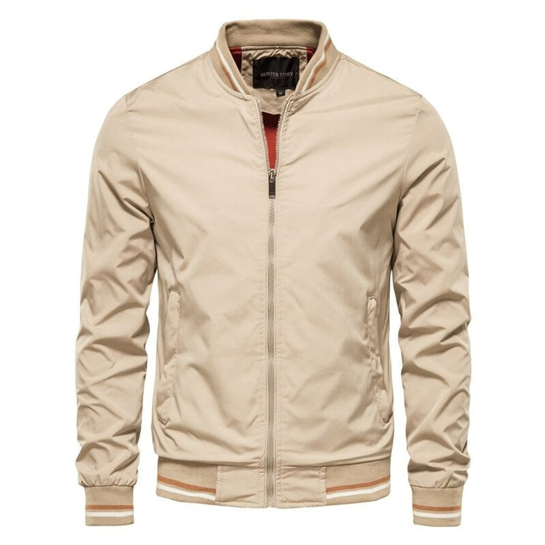 Ruben beige bomberjack met oranje-witte geribde boorden, vooraanzicht