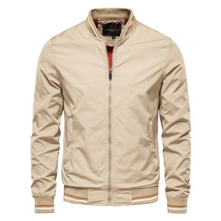 Ruben beige bomberjack met oranje-witte geribde boorden, vooraanzicht